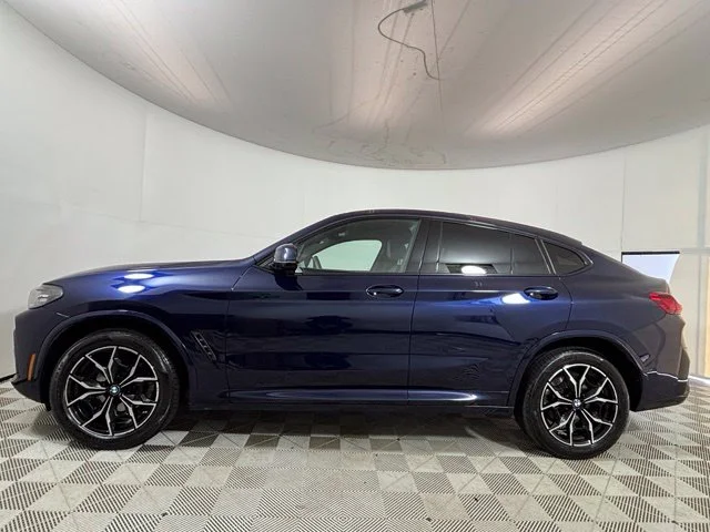 Used 2024 Tanzanite Blue II Metallic BMW xDrive30i image 4