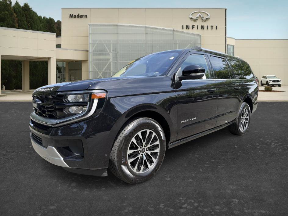 Used 2025 Black Metallic Ford Platinum image 1
