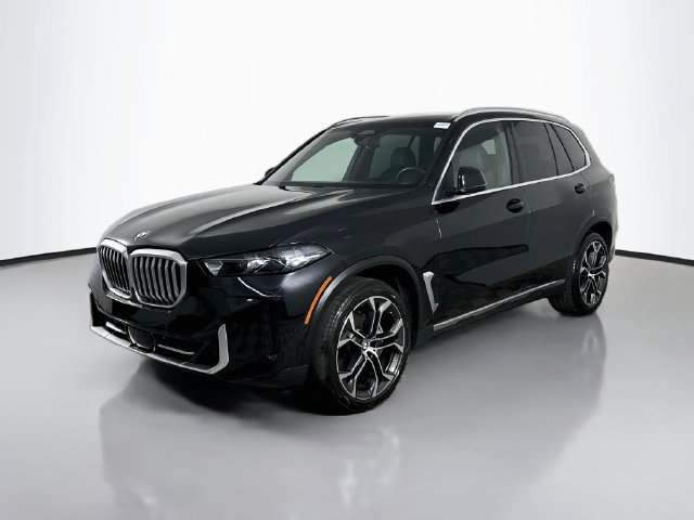 Used 2024 Black Sapphire Metallic BMW sDrive40i image 3