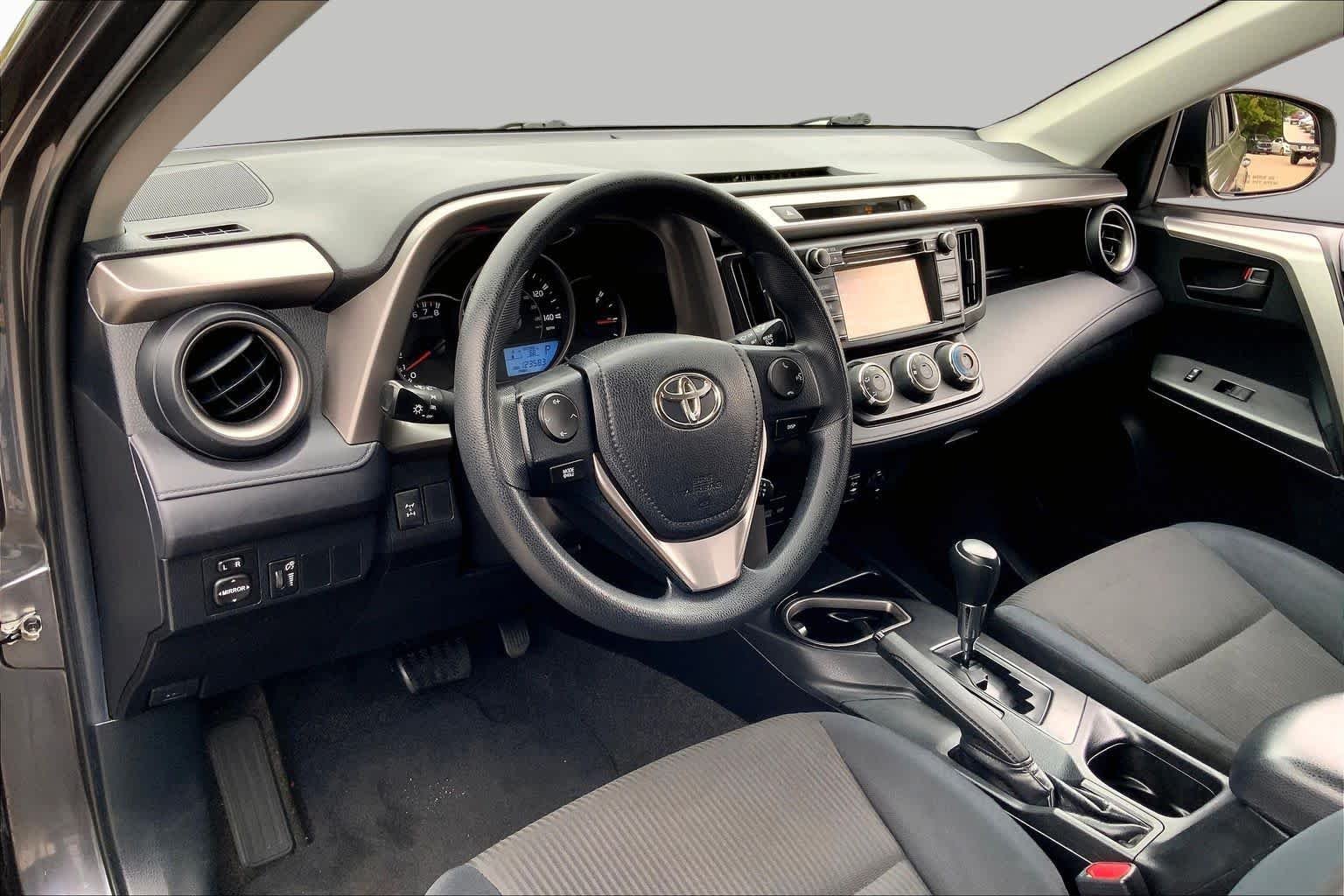 Used 2016 Magnetic Gray Metallic Toyota LE image 18
