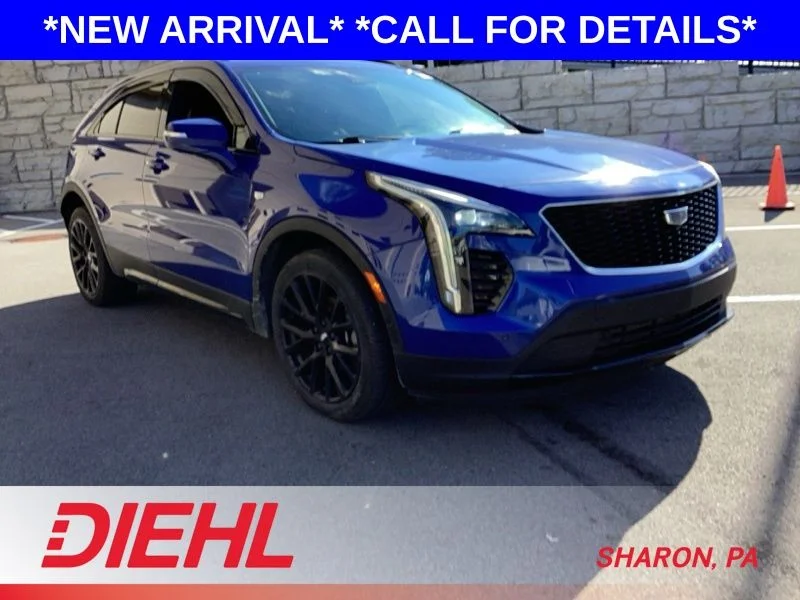 Used 2022 Blue Cadillac Sport image 1