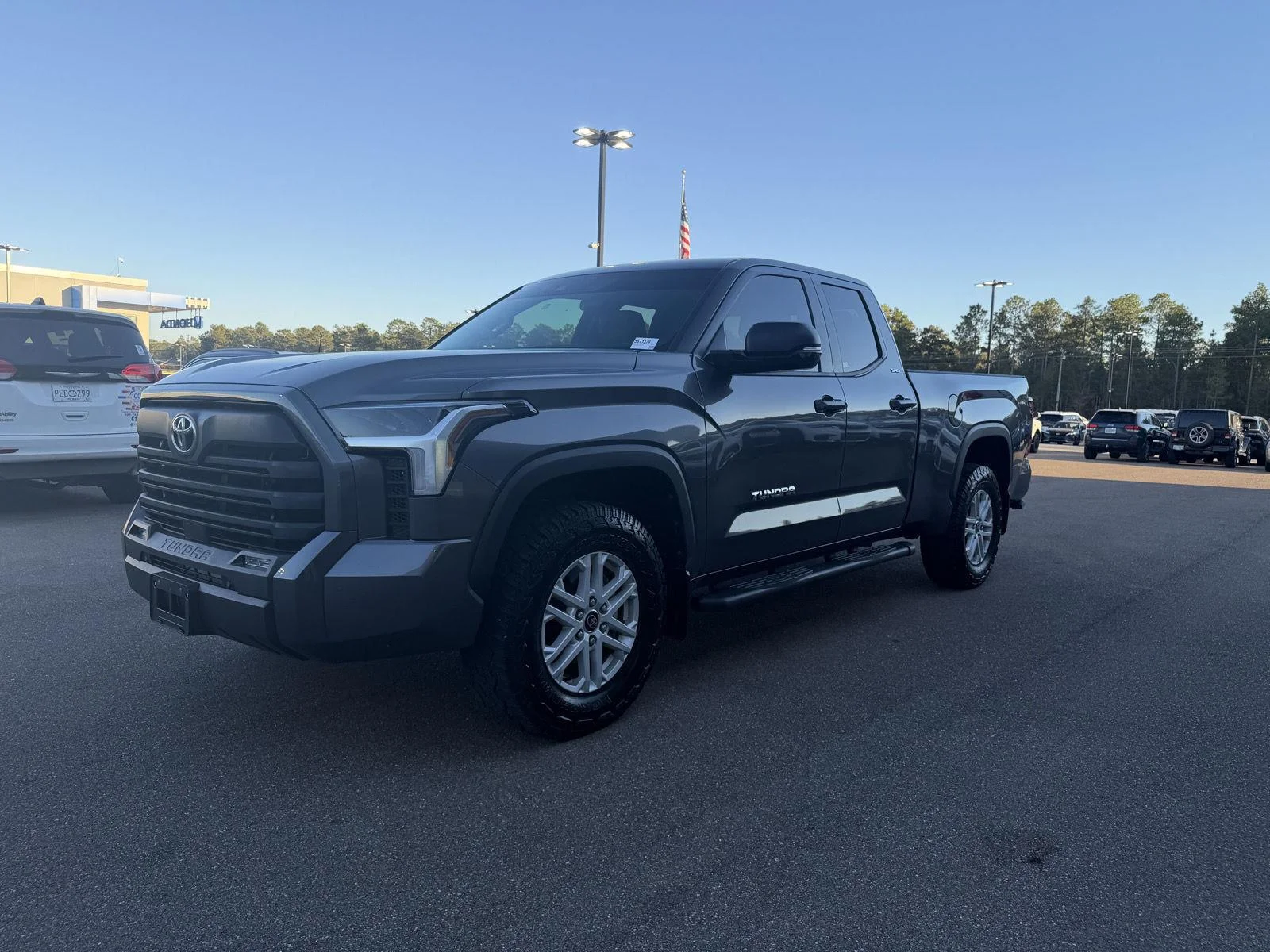 Used 2024 Magnetic Gray Metallic Toyota SR5 image 1