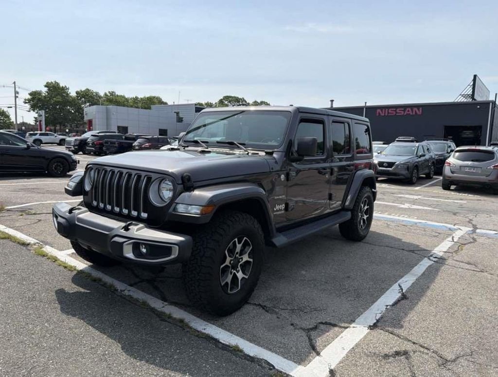 Used 2018 Gray Jeep Unlimited Sahara image 1