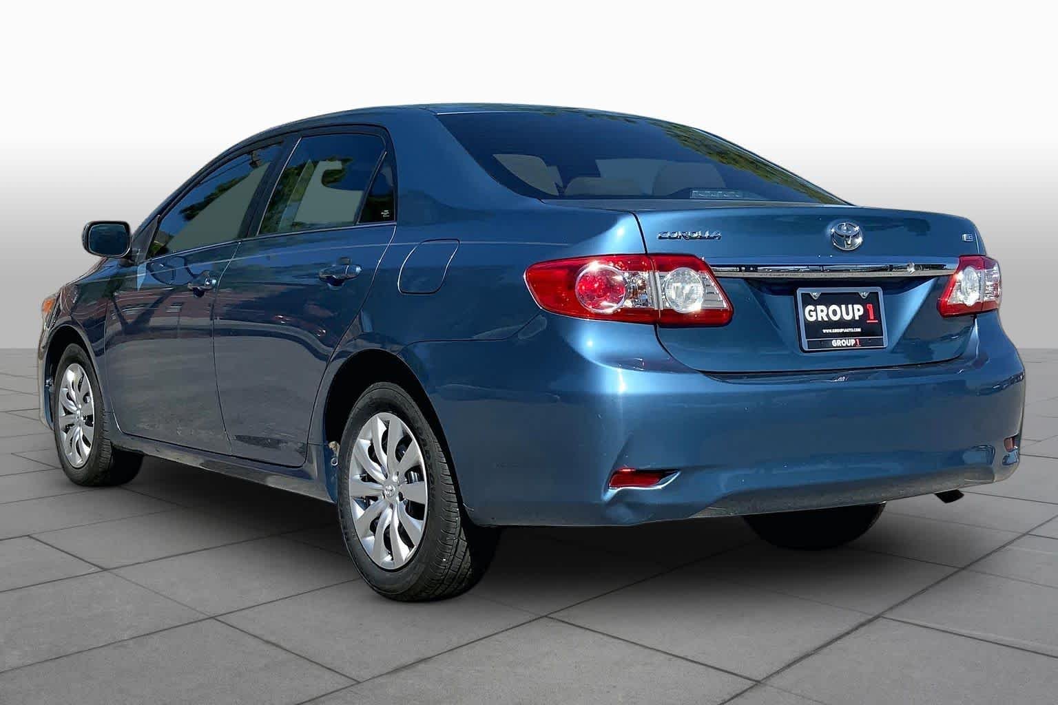 Used 2013 Tropical Sea Metallic Toyota LE image 12