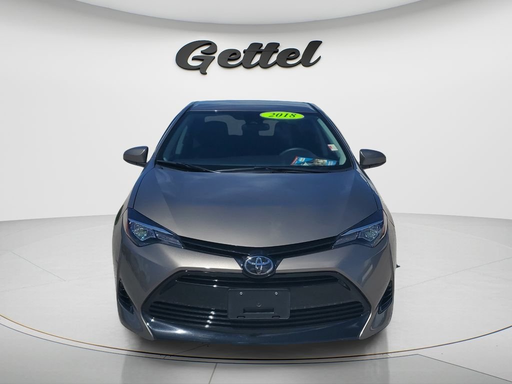 Used 2018 Toyota Corolla LE with VIN 5YFBURHE2JP779006 for sale in Punta Gorda, FL