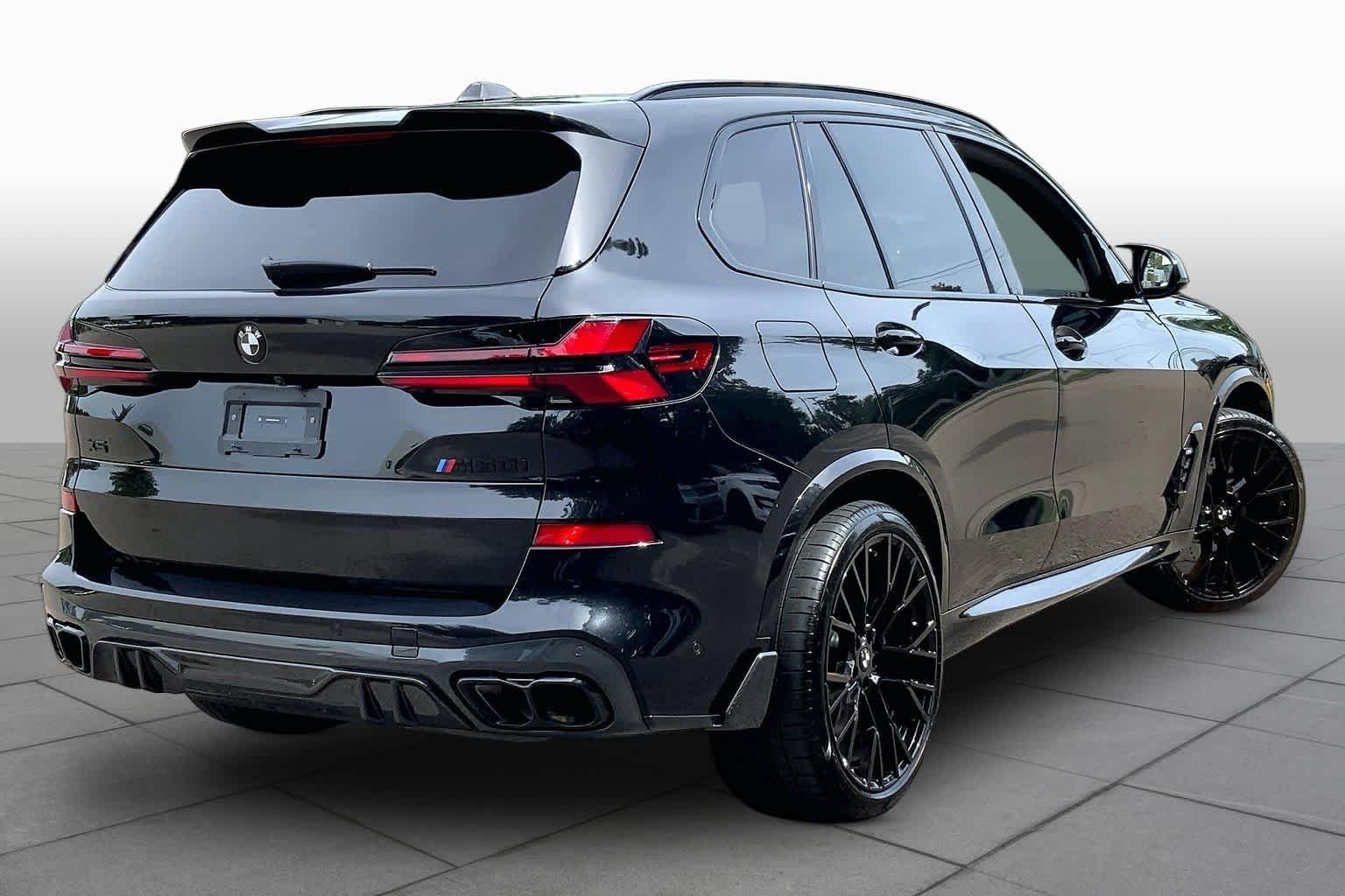 Used 2025 Black Sapphire Metallic BMW M60i image 13