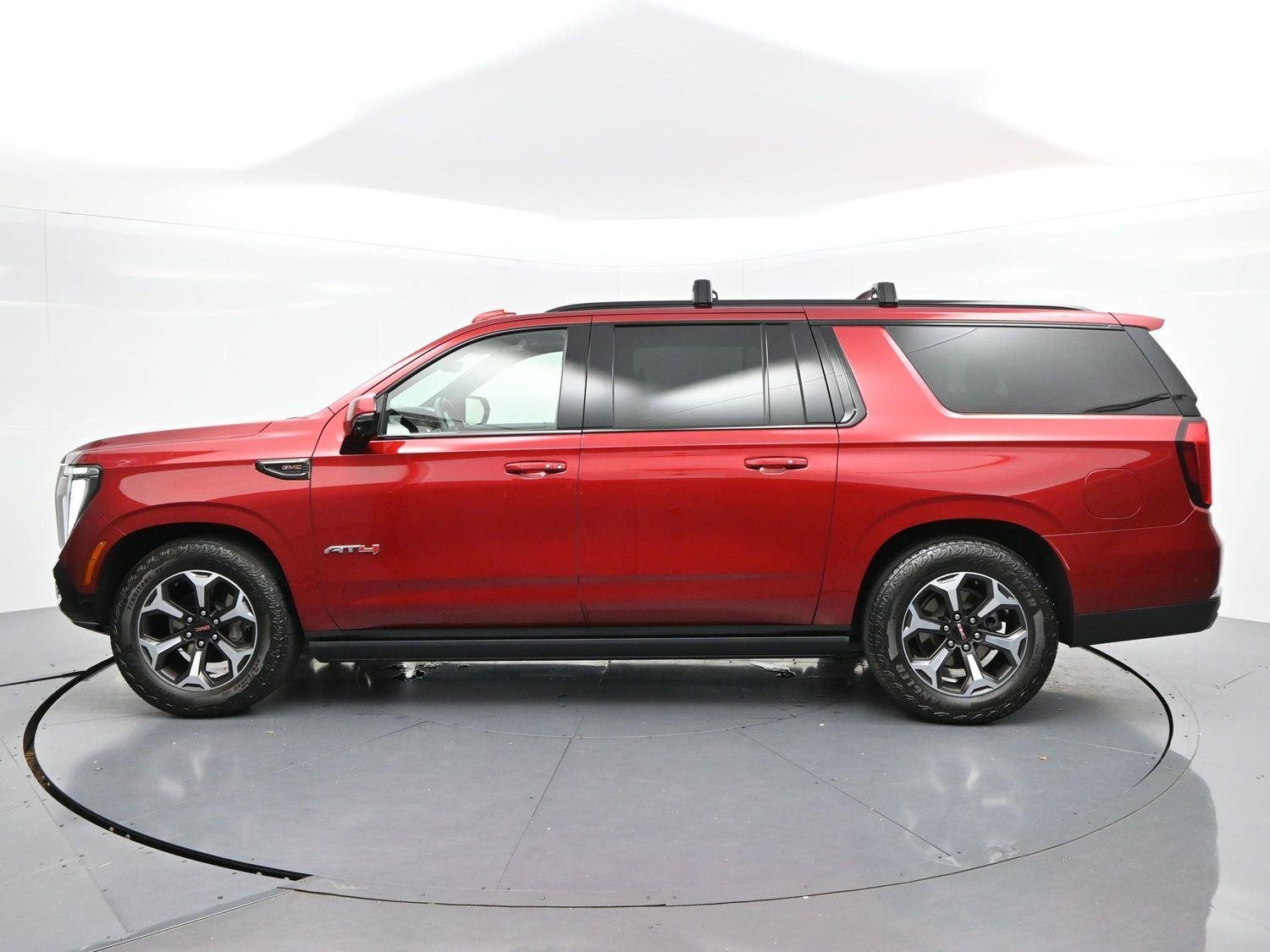 Used 2025 Volcanic Red Tintcoat GMC AT4 Ultimate image 4