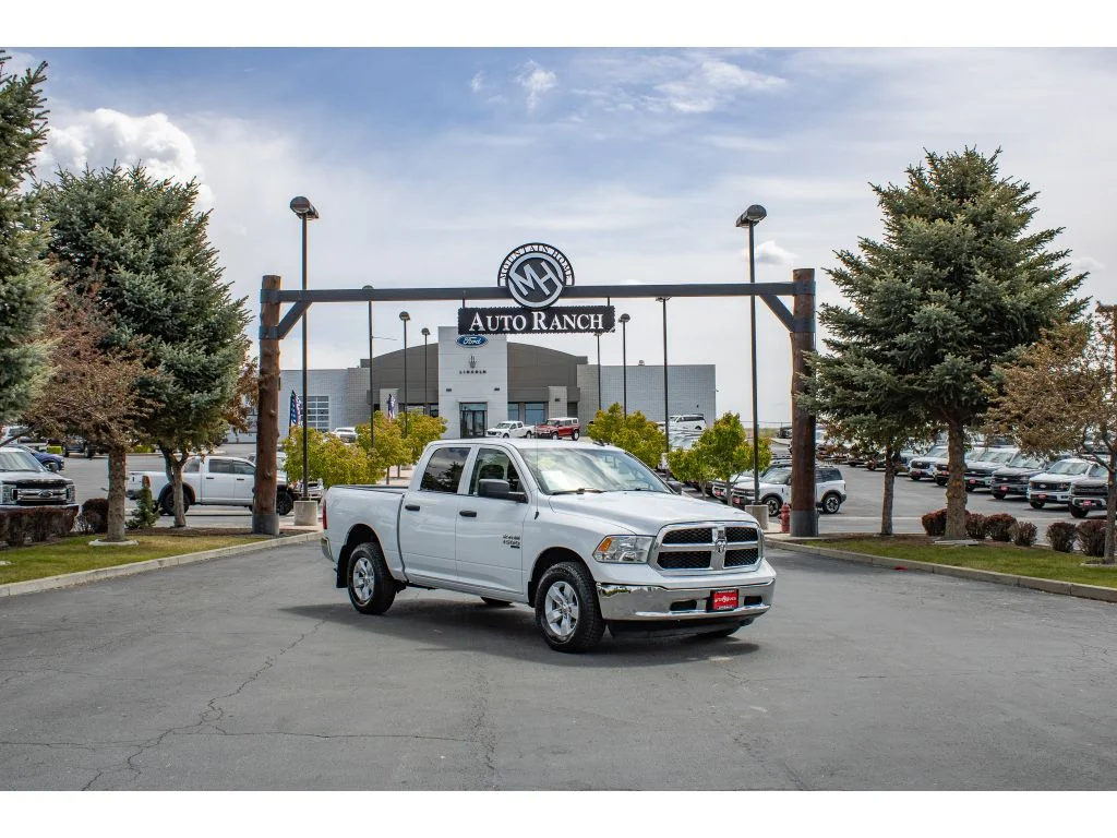 Used 2023 Bright White Clearcoat Ram SLT image 1