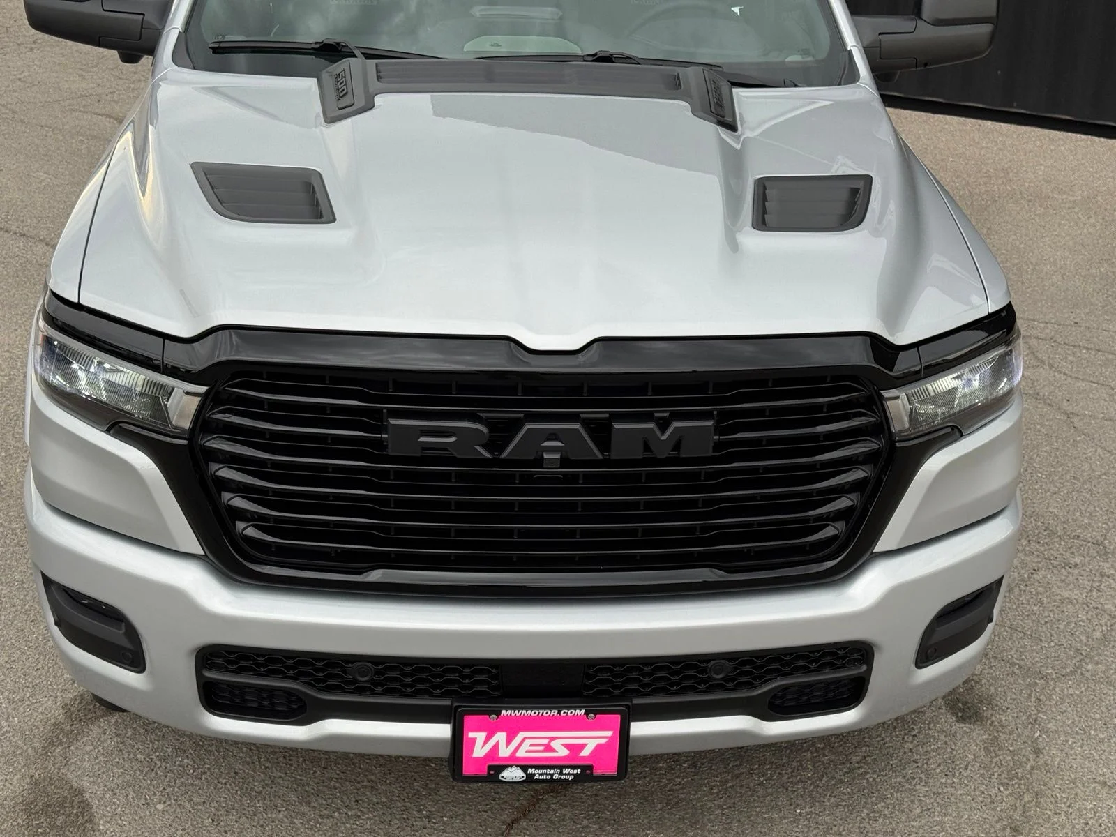 New 2026 Silver Zynith Exterior Paint RAM Laramie image 3