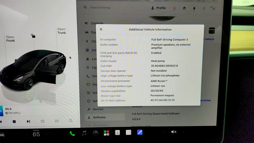 Used 2023 Solid Black Tesla RWD image 16