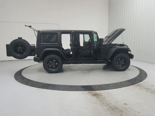 New 2026 Black Clearcoat Jeep Sport image 16