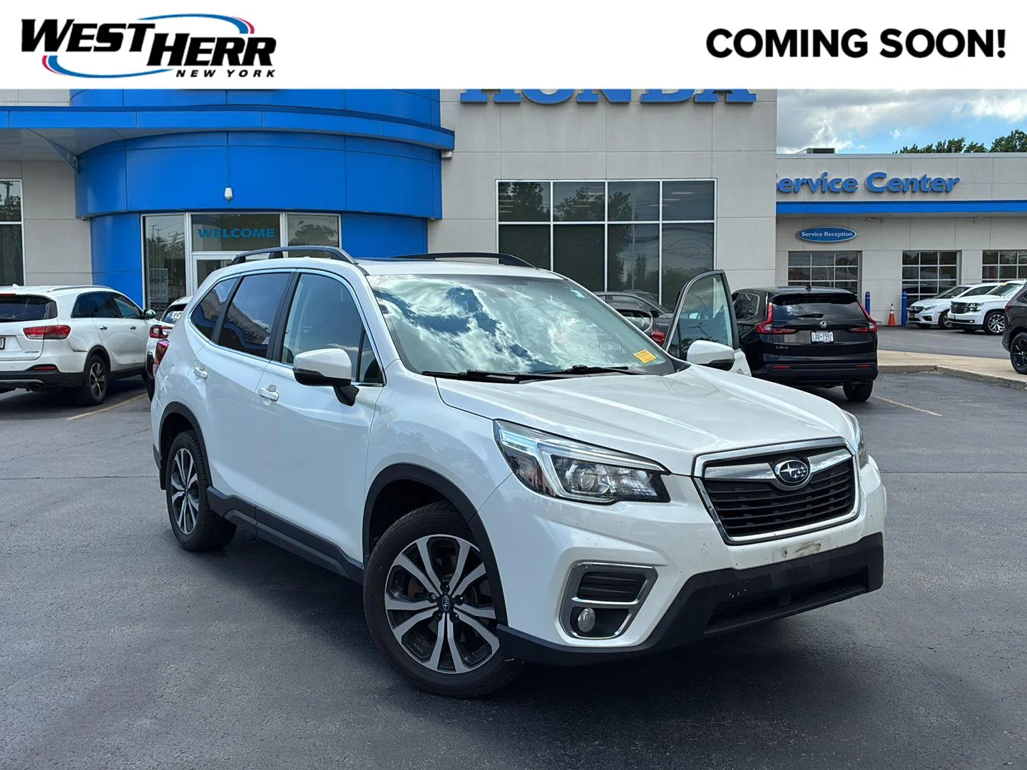 Used 2019 Crystal White Pearl Subaru Limited image 1