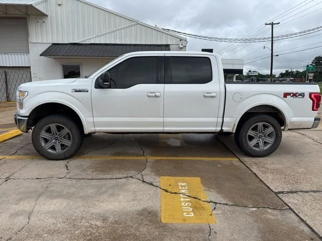 Used 2015 White Ford Lariat image 1