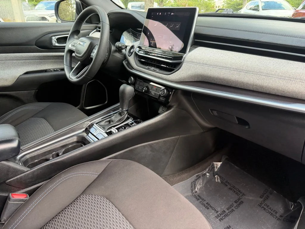 Used 2023 Laser Blue Jeep Sport image 10