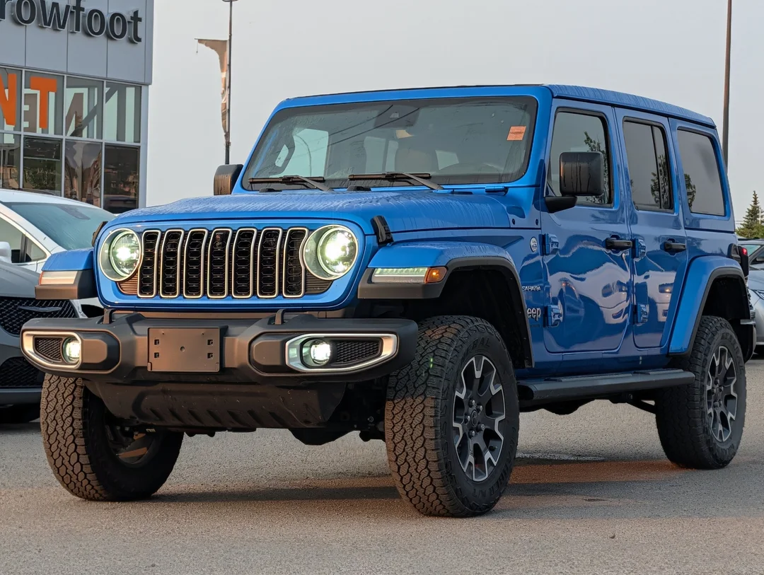 Used 2024 Blue Jeep Sahara - - 4x4 - Leather Seats - Power Soft Top - Remote Start & More! image 4