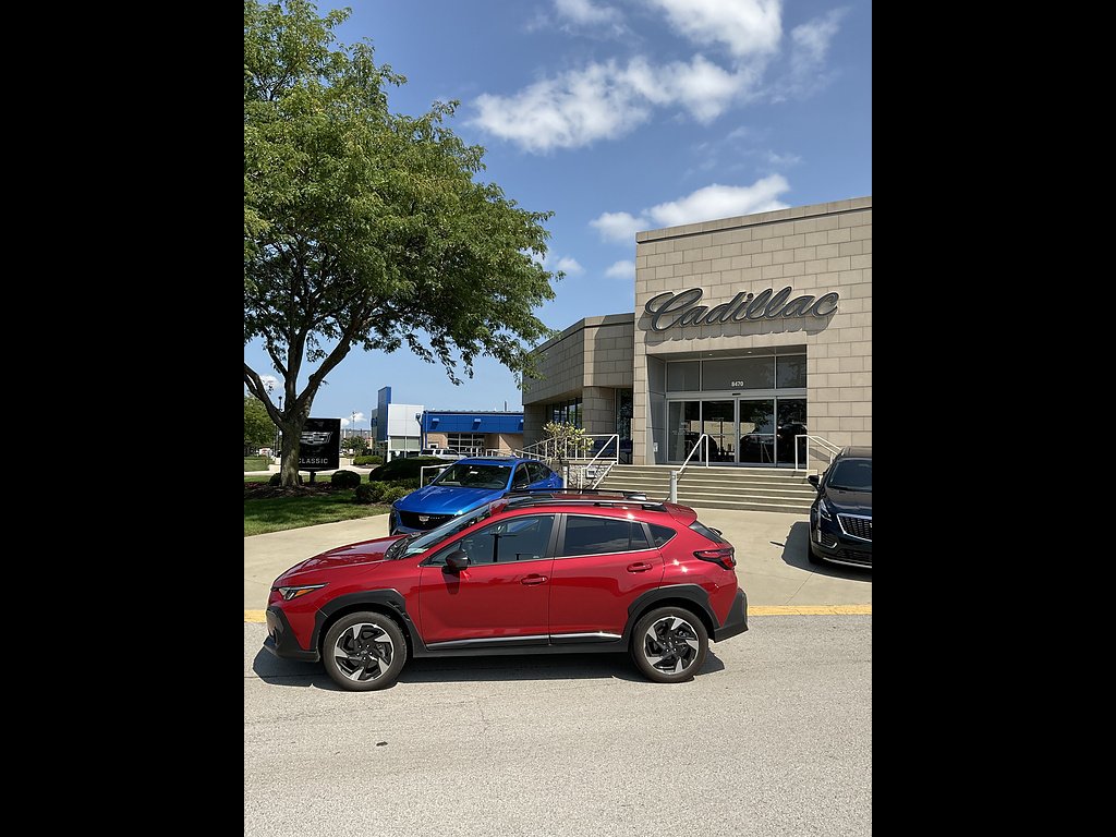 Used 2025 Lithium Red Pearl Subaru Limited image 1