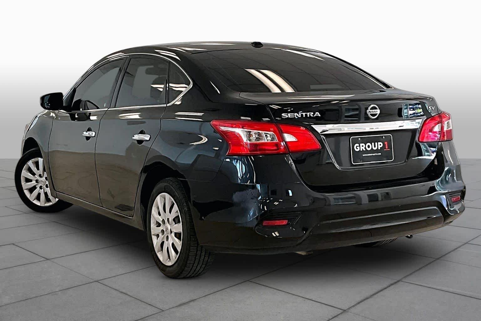 Used 2017 Super Black Nissan SV image 11