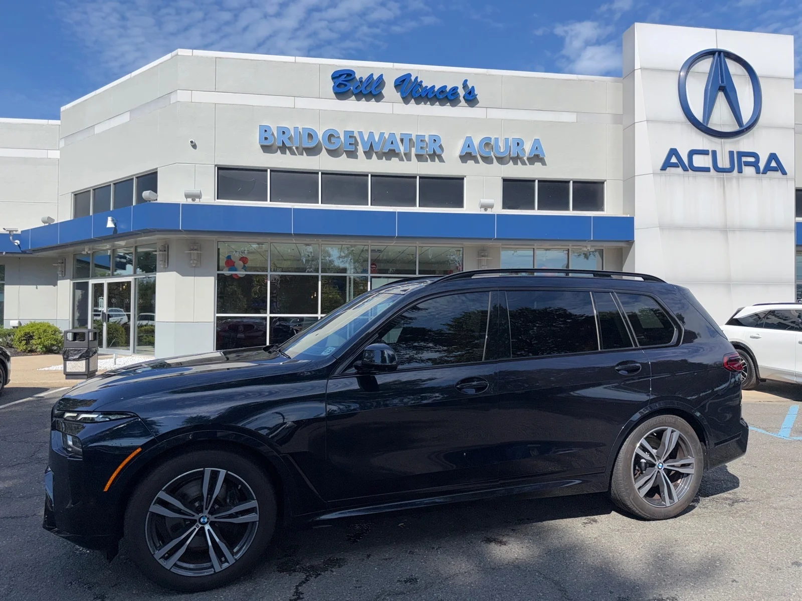 Used 2024 Carbon Black Metallic BMW xDrive40i image 1