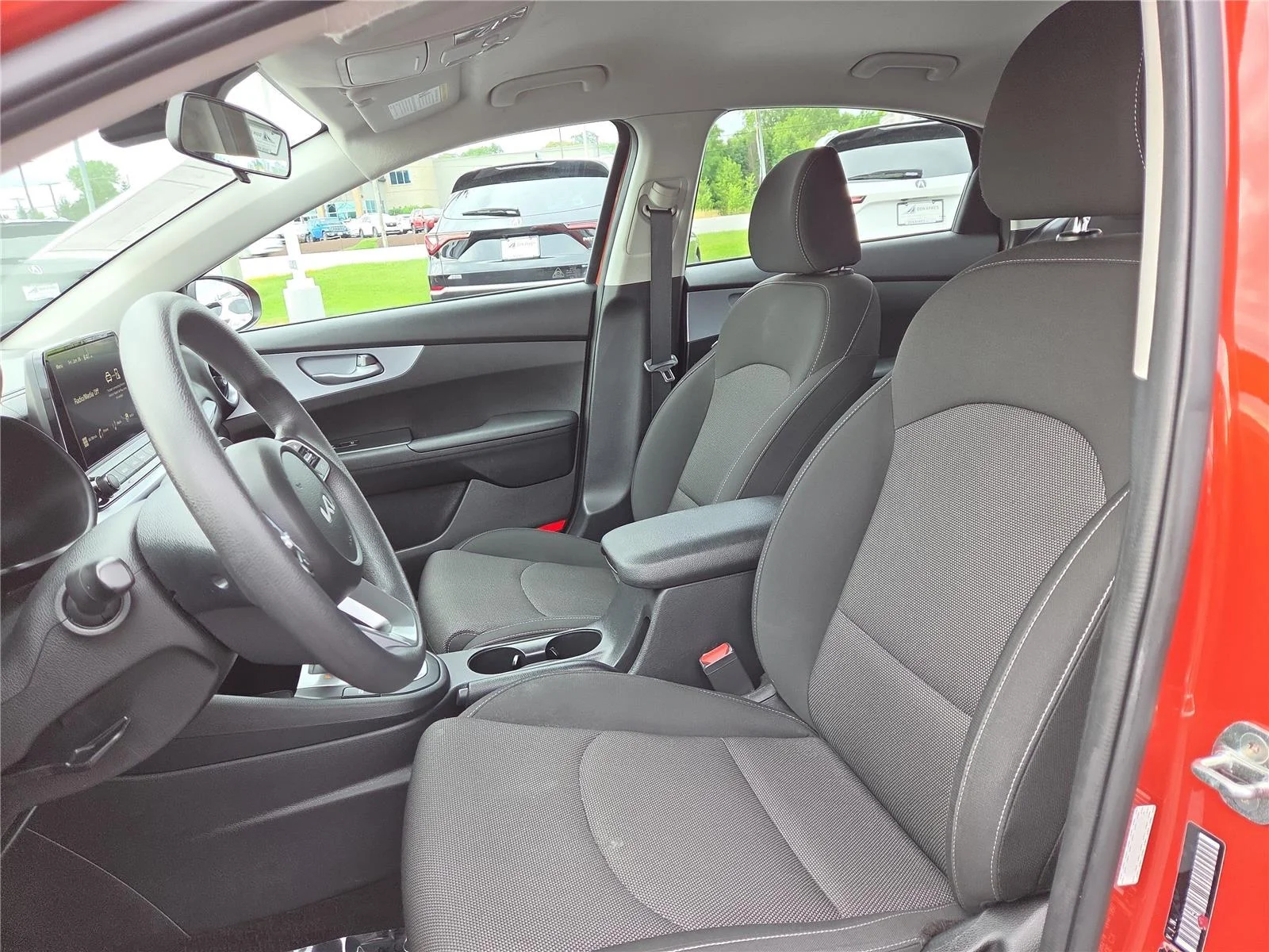 Used 2023 Fire Orange Kia LXS image 19