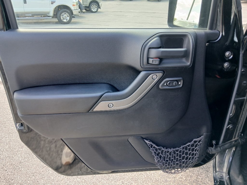 Used 2015 Black Clearcoat Jeep Sport image 9