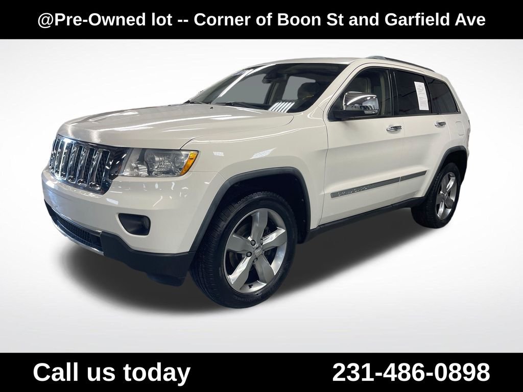 Used 2011 White Jeep Overland image 1