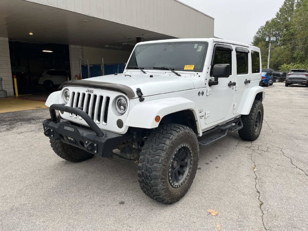 Used 2016 White Jeep Unlimited Sahara image 12