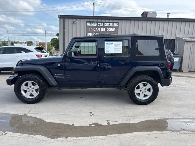 Used 2013 Blue Jeep Unlimited Sport image 4