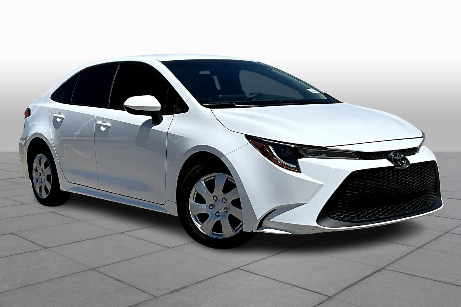 Used 2021 Super White Toyota LE image 3