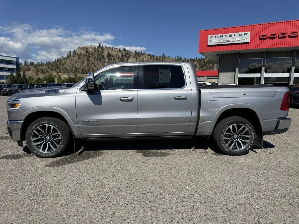 Used 2025 Silver RAM Limited Longhorn 4x4 Crew Cab 5