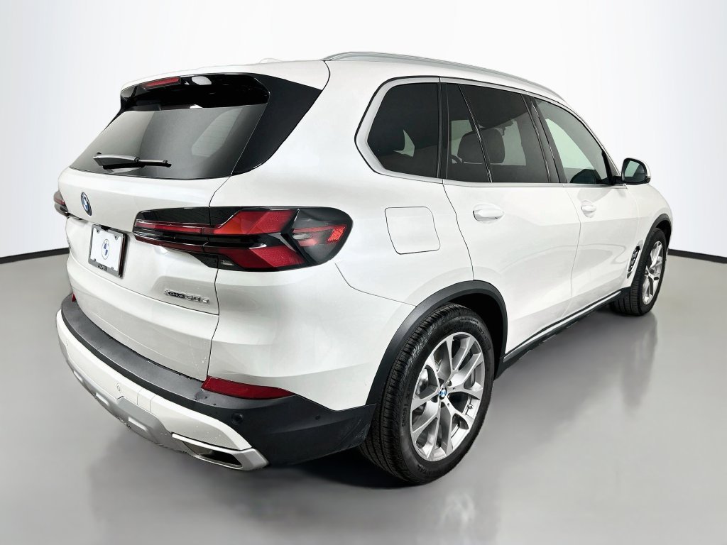 Used 2026 White Metallic BMW xDrive50e image 5