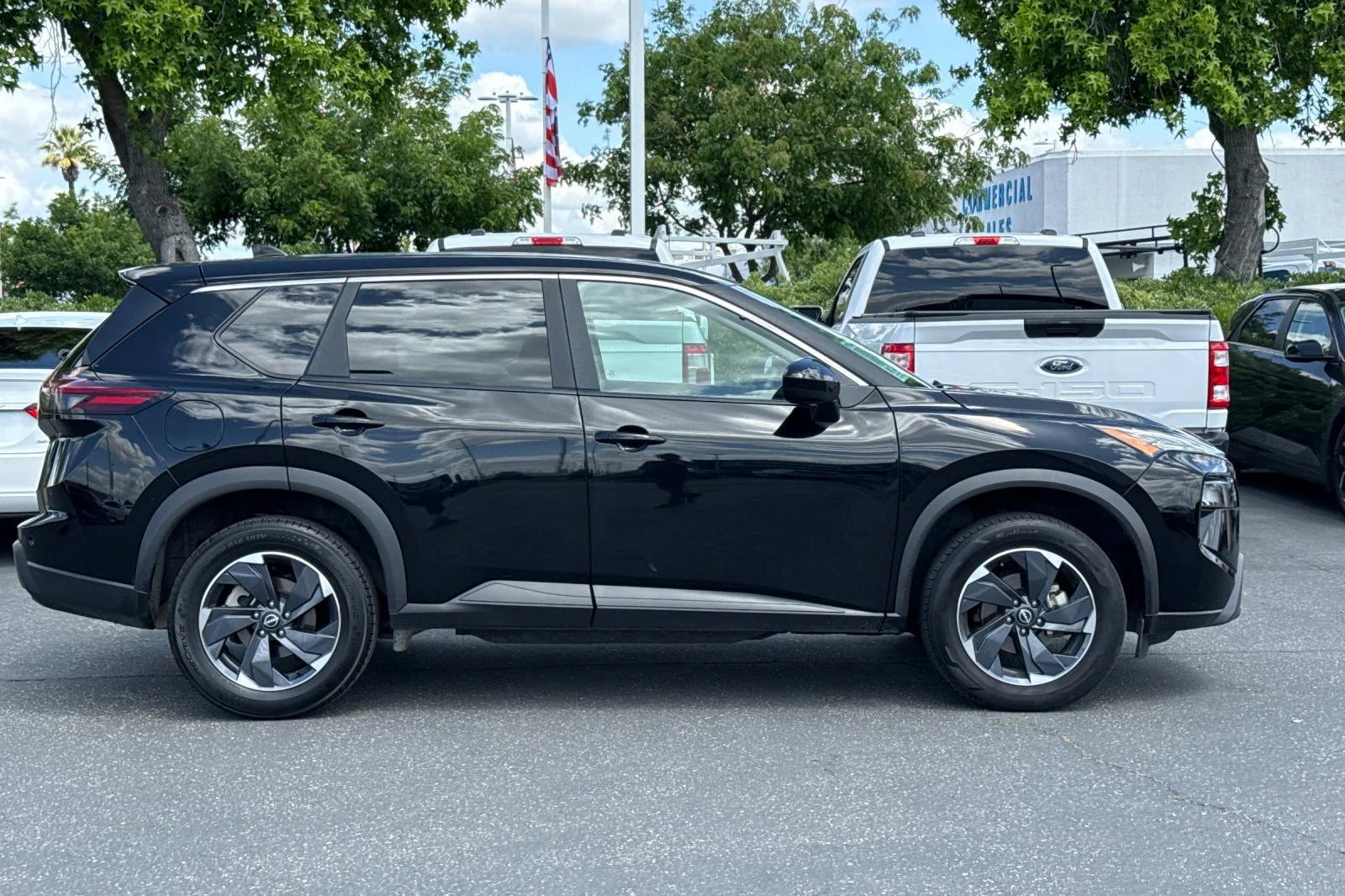 Used 2024 Super Black Nissan SV image 3