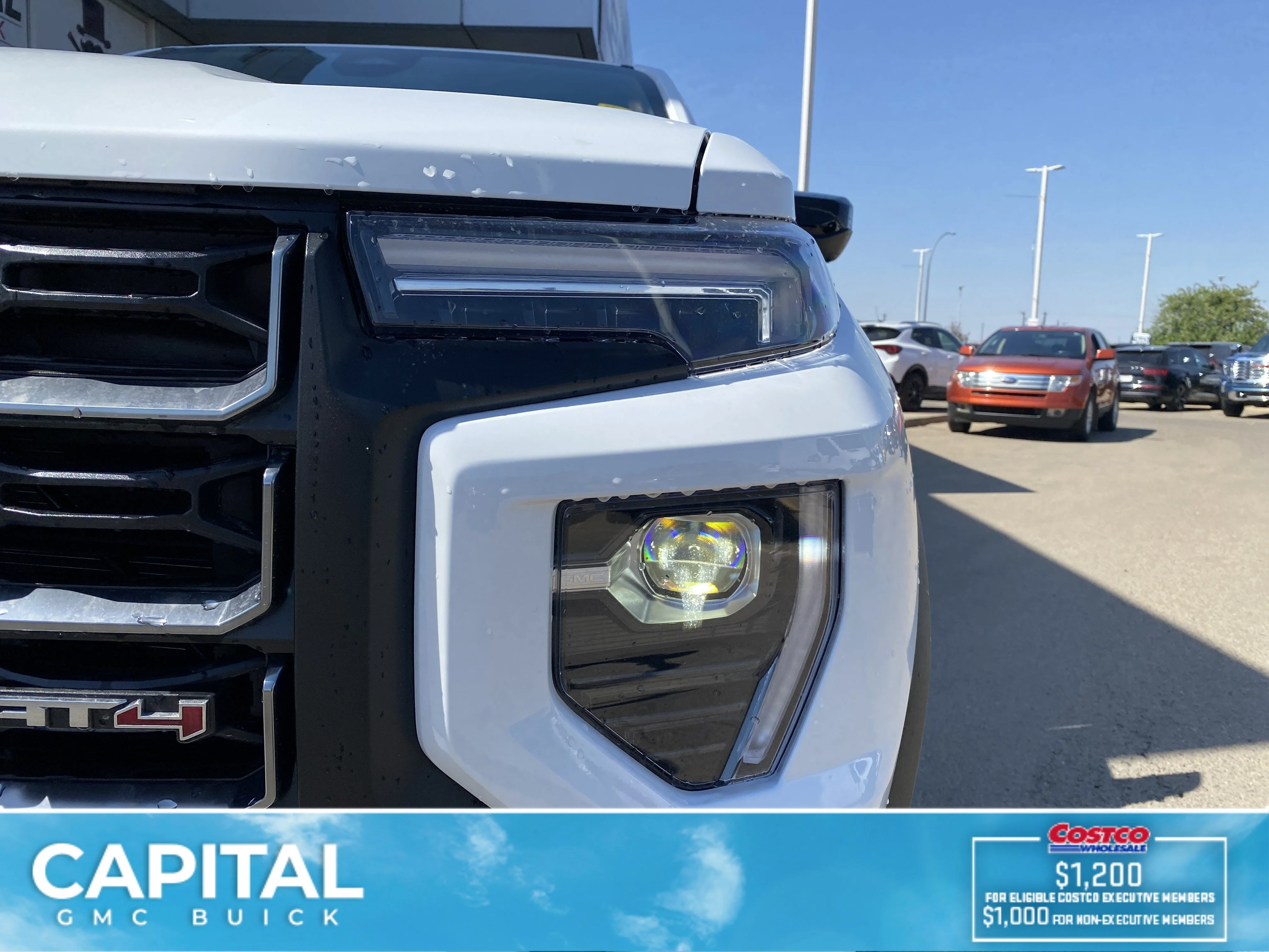 New 2026 Summit White GMC 4WD AT4 image 9