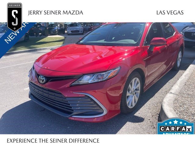 Used 2023 Supersonic Red Toyota LE image 1
