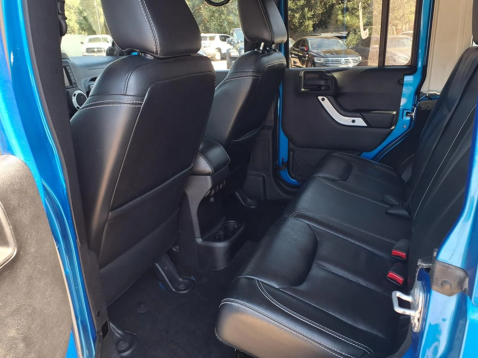 Used 2014 Blue Jeep Unlimited Sahara image 19