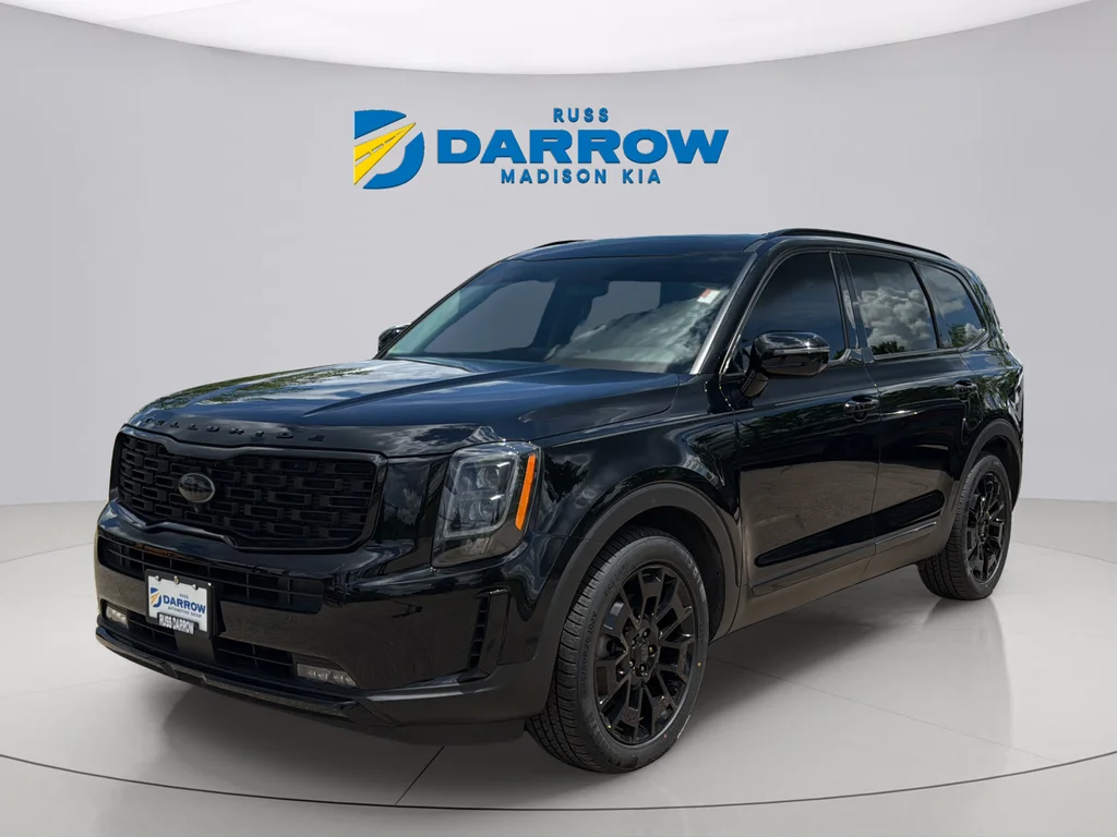 Used 2021 Ebony Black Kia SX image 1