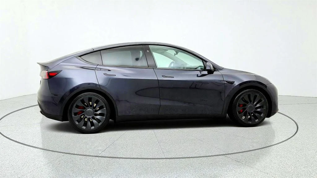 Used 2024 Stealth Grey Tesla Performance AWD w/ White & Black Interior image 4