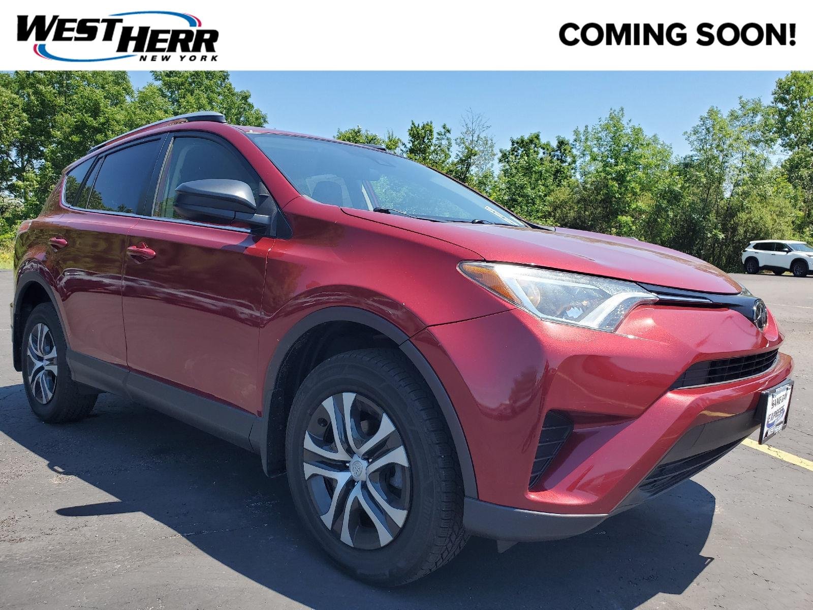 Used 2018 Ruby Flare Pearl Toyota LE image 1