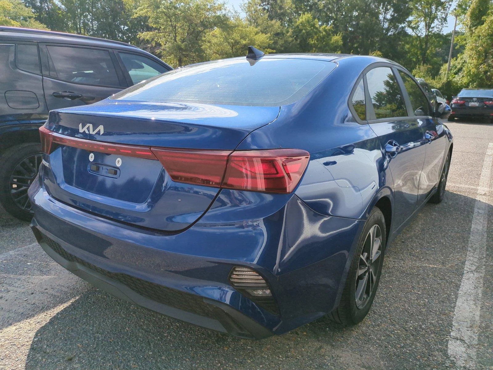 Used 2024 Deep Sea Blue Kia LXS image 3