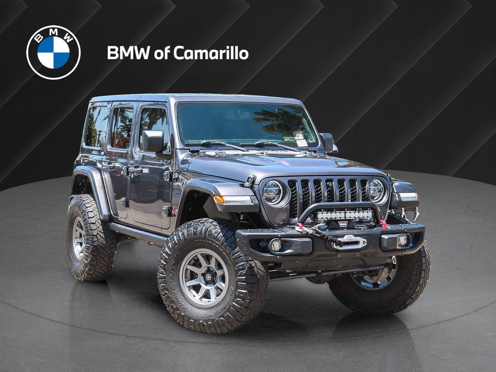 Used 2021 Granite Crystal Metallic Clearcoat Jeep Unlimited Rubicon image 1