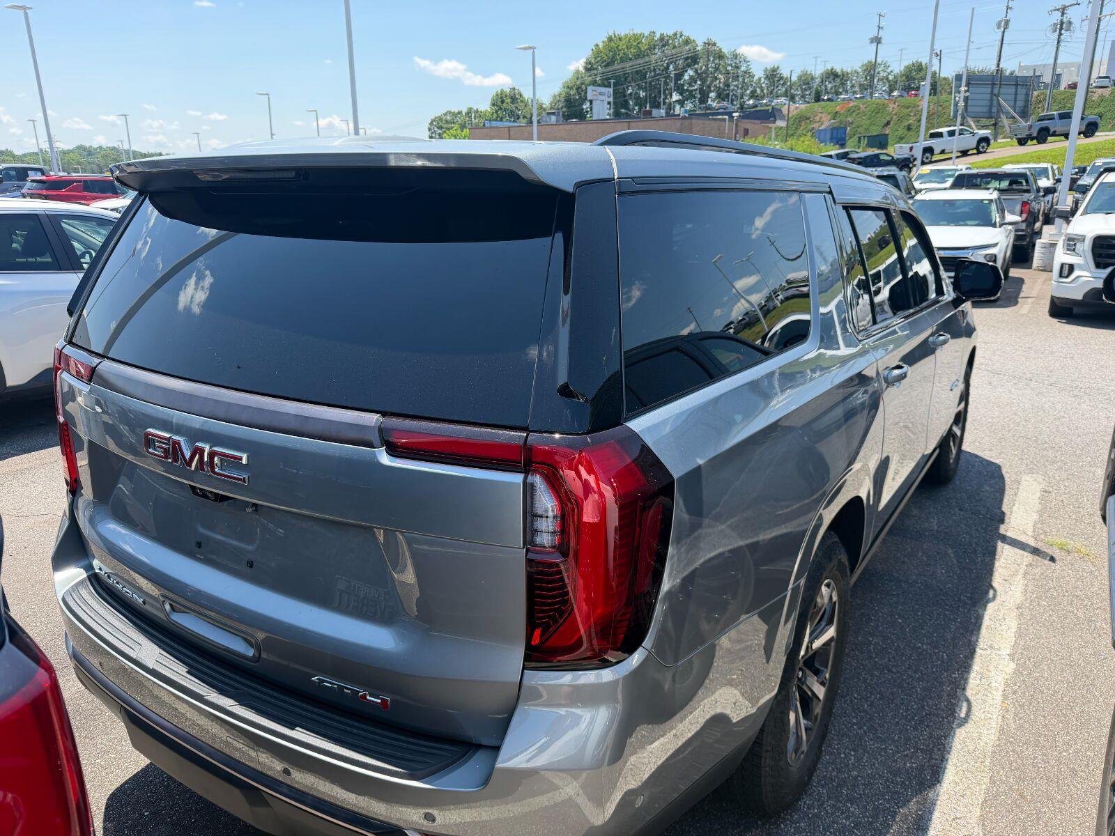 Used 2025 Sterling Metallic GMC AT4 Ultimate image 4
