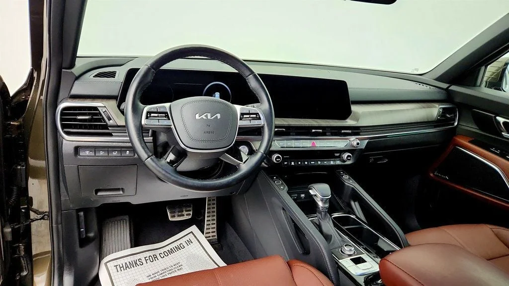 Used 2025 Dark Moss Kia SX AWD w/ Captain
