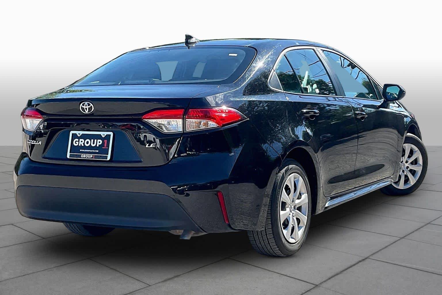 Used 2025 Midnight Black Metallic Toyota LE image 13