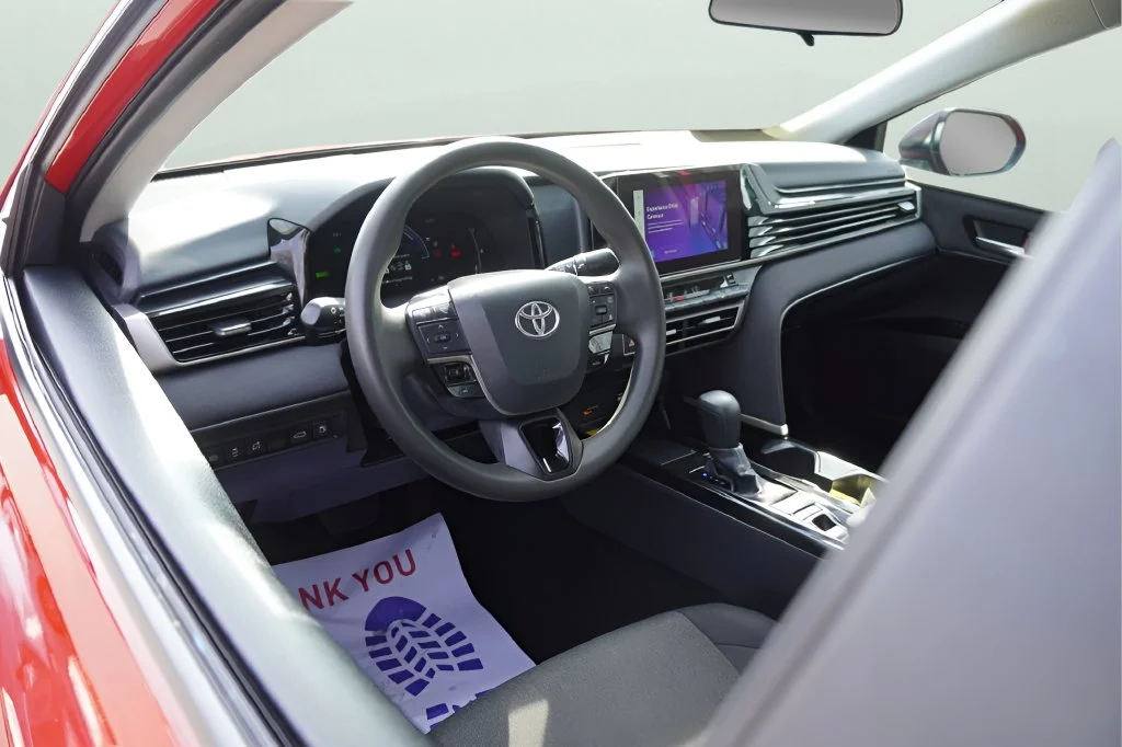 Used 2025 Supersonic Red Toyota LE image 12