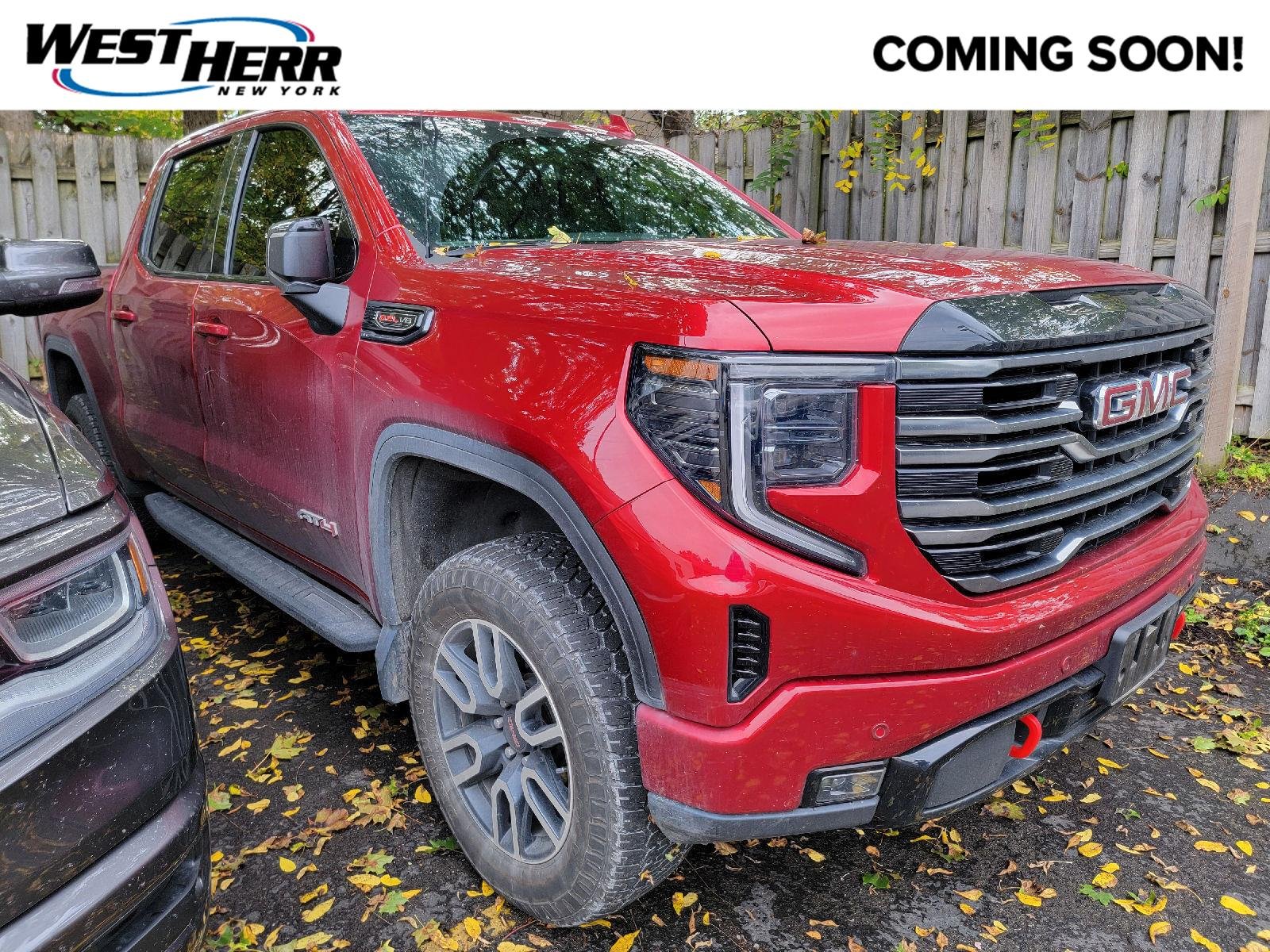 Used 2025 Volcanic Red Tintcoat GMC AT4 image 1