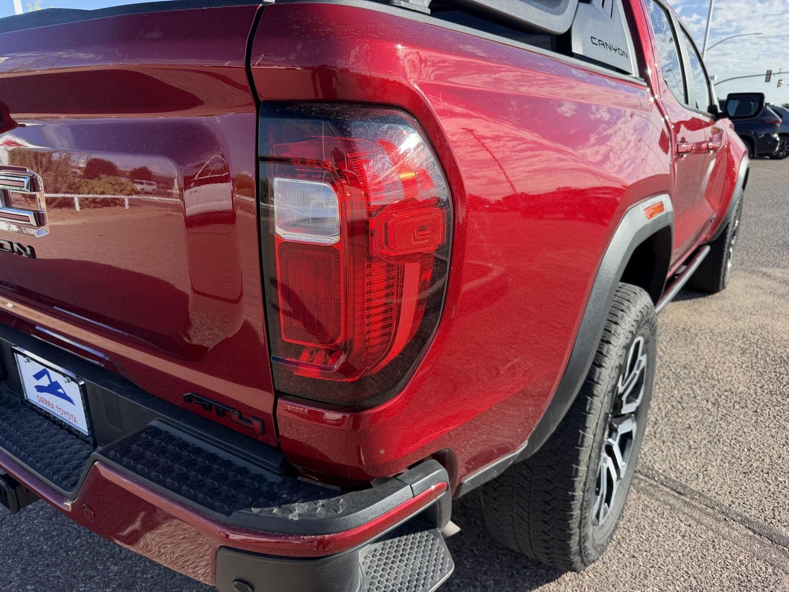 Used 2025 Volcanic Red Tintcoat GMC 4WD AT4 image 13