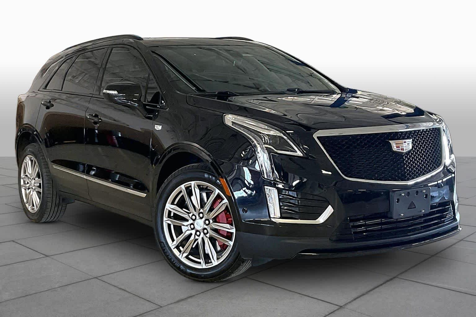 Used 2025 Stellar Black Metallic Cadillac AWD Sport image 2
