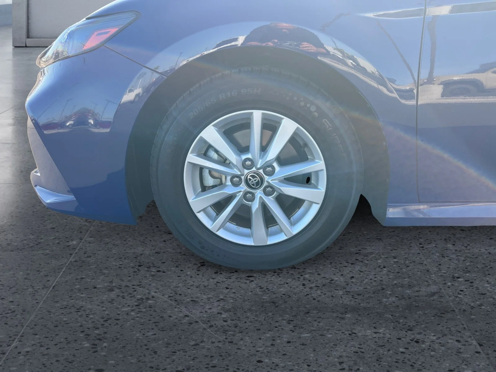 Used 2025 Reservoir Blue Toyota LE image 9