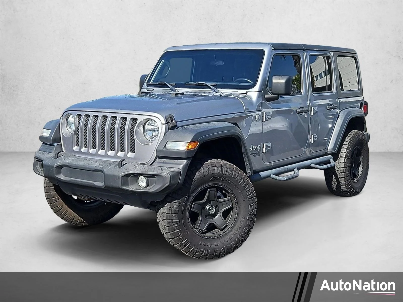 Used 2020 Billet Silver Metallic Clearcoat Jeep Sport S image 1
