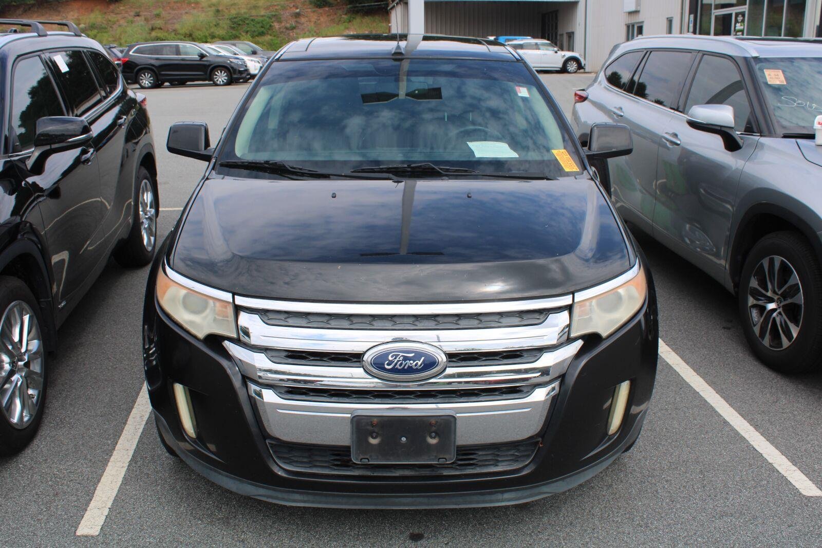 Used 2011 Tuxedo Black Metallic Ford SEL image 2