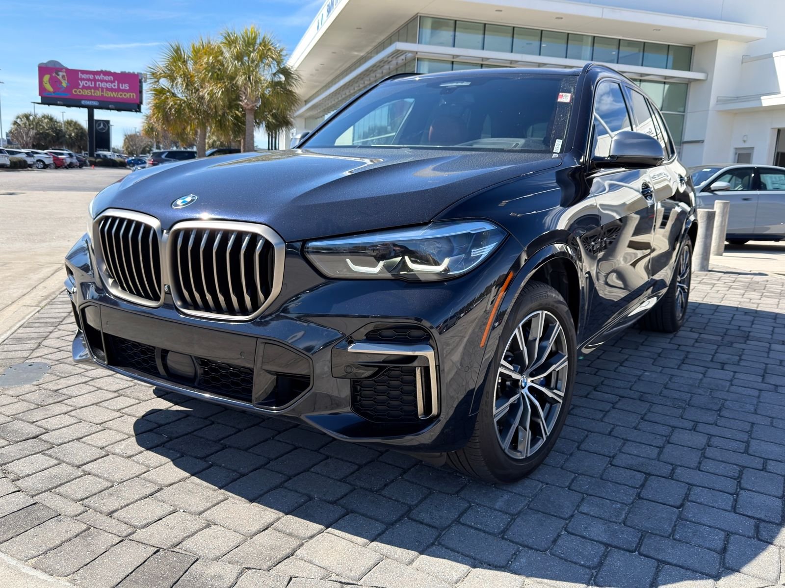 Used 2022 Carbon Black Metallic BMW M50i image 1